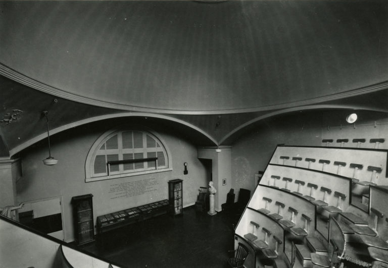 B&W photo of Ether Dome amphitheater, view from right on steps looking down to front.